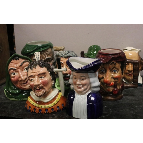 71 - Collection of approximately 16 Character Jugs and Toby Jugs including Sylvac Robin Hood series Jugs,... 
