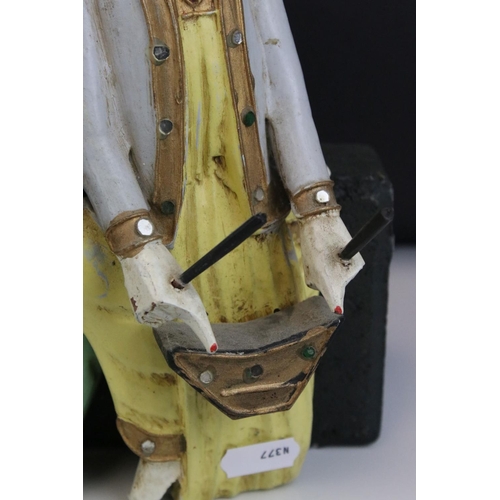 85 - Three South East Asian Painted Wooden Wall Hangings in the form of Musicians, 25cms high