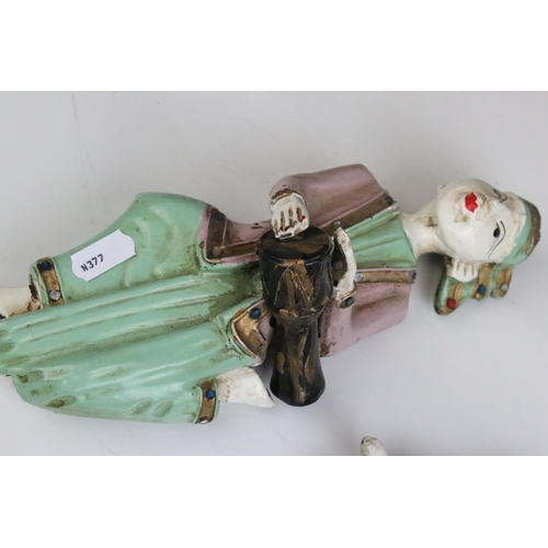 85 - Three South East Asian Painted Wooden Wall Hangings in the form of Musicians, 25cms high