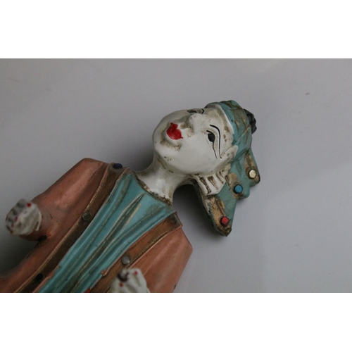 85 - Three South East Asian Painted Wooden Wall Hangings in the form of Musicians, 25cms high