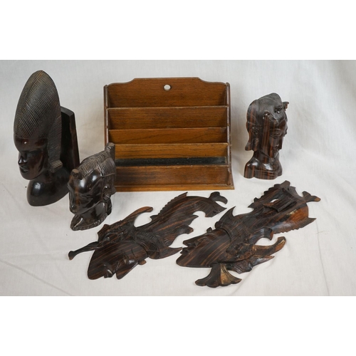 384 - A box of mixed collectables to include brass ware and african wooden carvings together with a leathe... 
