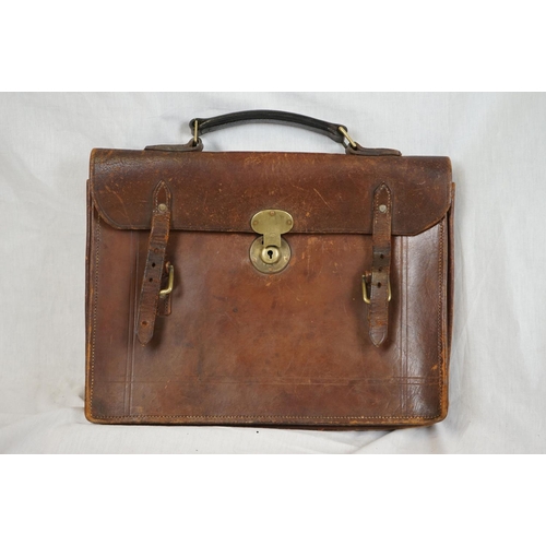 384 - A box of mixed collectables to include brass ware and african wooden carvings together with a leathe... 