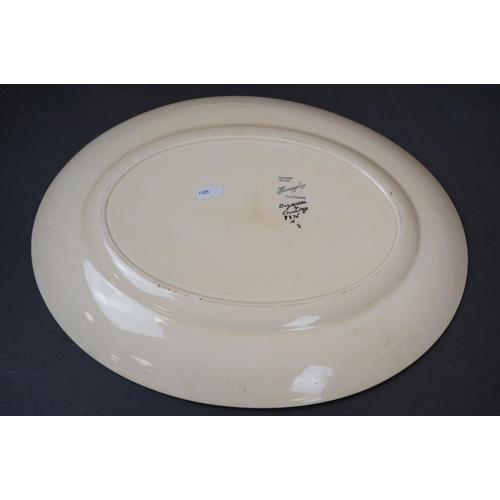 388 - A vintage ceramic wash basin and jug together with two Clarice Cliff Bizarre pattern platters.