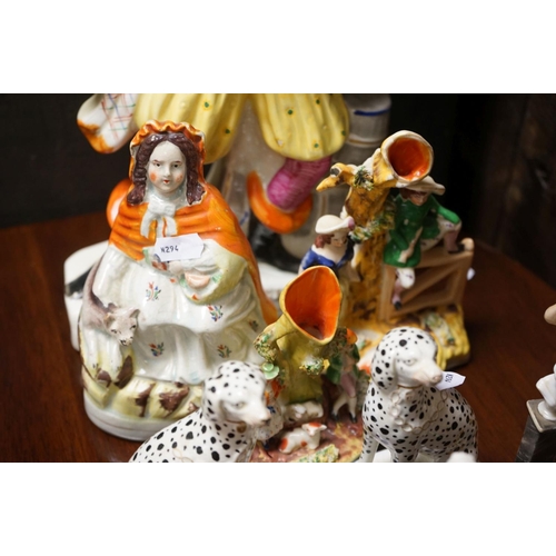 390 - Antique Porcelain Wall Bracket, blue cross sword marks and a 19th century figure of a Dandy together... 