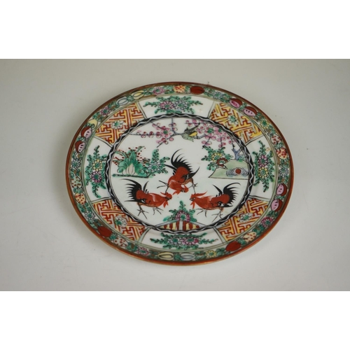 396 - Pair of Oriental hand painted ceramic plates depicting fighting cockerels