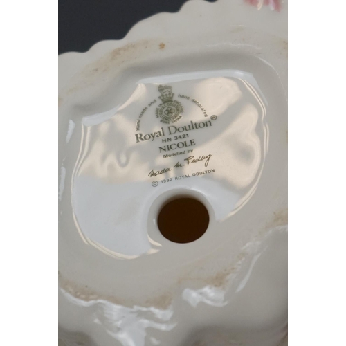 399 - A collection of mixed ceramics to include Royal Doulton figures and Sylvac Pixie vase.