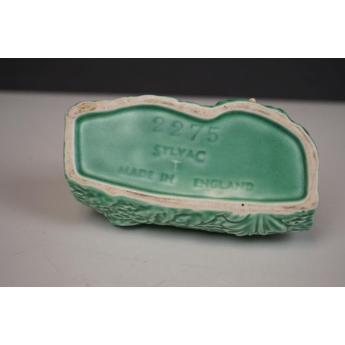 399 - A collection of mixed ceramics to include Royal Doulton figures and Sylvac Pixie vase.