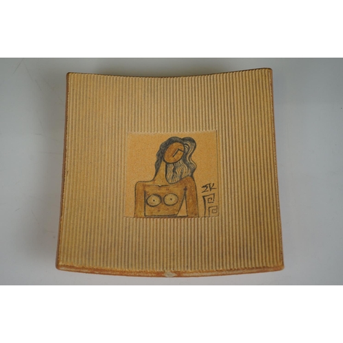 401 - A contemporary pottery bowl of square form decorated in the style of Pablo Picasso with indistinct s... 