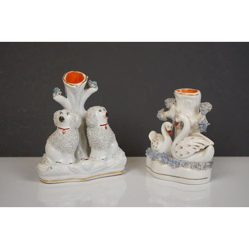 405 - Two 19th century Staffordshire Pastille Burners, two pairs of similar spill holders of sheep and swa... 