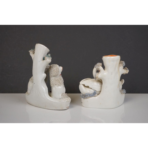 405 - Two 19th century Staffordshire Pastille Burners, two pairs of similar spill holders of sheep and swa... 