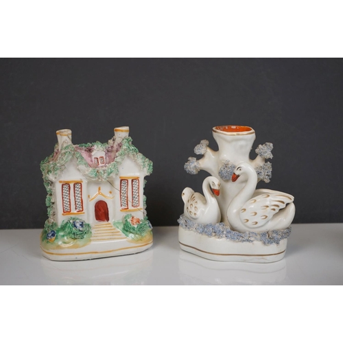 405 - Two 19th century Staffordshire Pastille Burners, two pairs of similar spill holders of sheep and swa... 