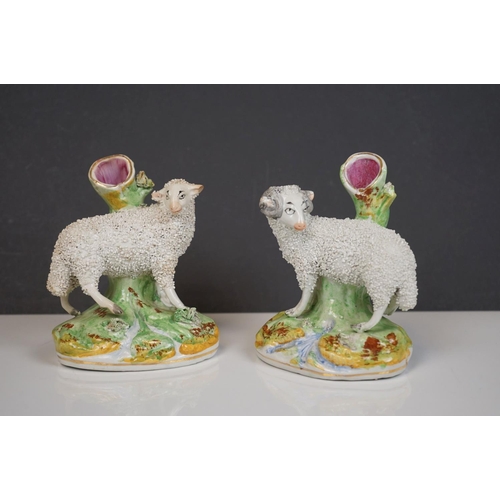 405 - Two 19th century Staffordshire Pastille Burners, two pairs of similar spill holders of sheep and swa... 