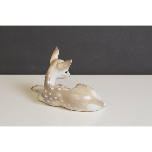 415 - Four Russian Lomonsov figures to include Stag, Tiger Cheetah and Fawn.