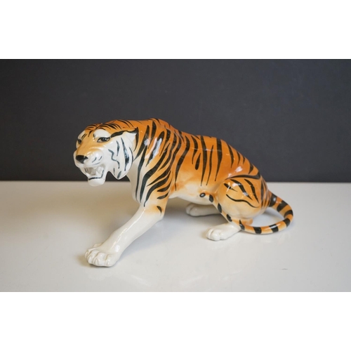 415 - Four Russian Lomonsov figures to include Stag, Tiger Cheetah and Fawn.