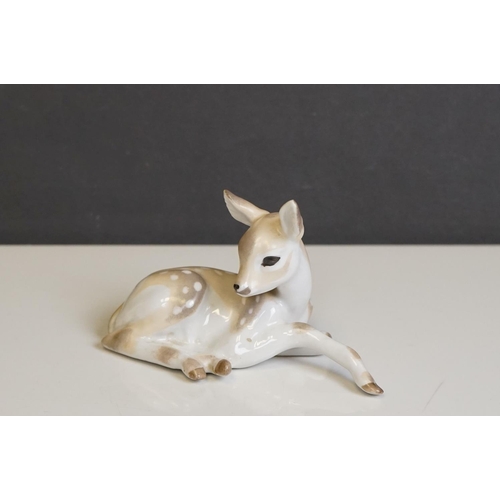 415 - Four Russian Lomonsov figures to include Stag, Tiger Cheetah and Fawn.