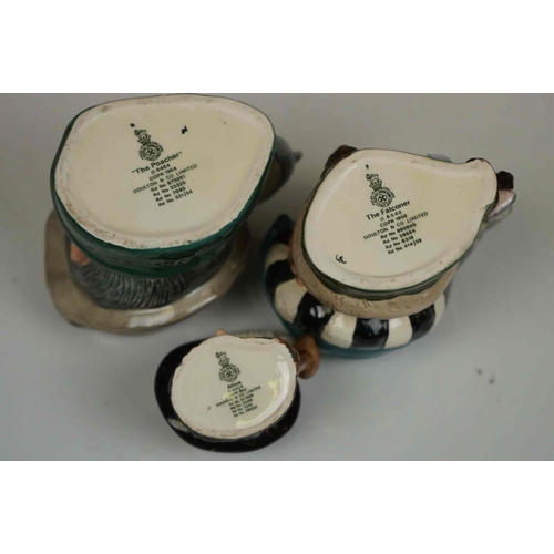 417 - A collection of four Royal Doulton character jugs together with a Royal Doulton toby jug.