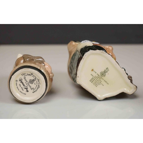 417 - A collection of four Royal Doulton character jugs together with a Royal Doulton toby jug.