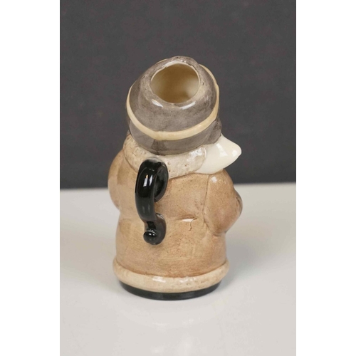 417 - A collection of four Royal Doulton character jugs together with a Royal Doulton toby jug.