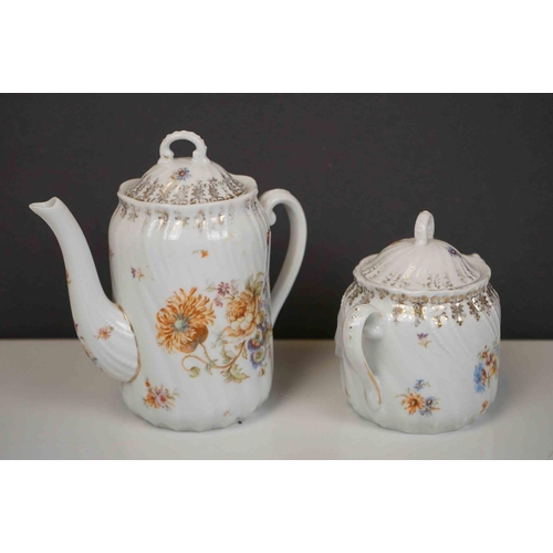 421 - A Sitzendorf wall pocket with cherub Decoration, two floral wall pockets, a ceramic art pottery bowl... 