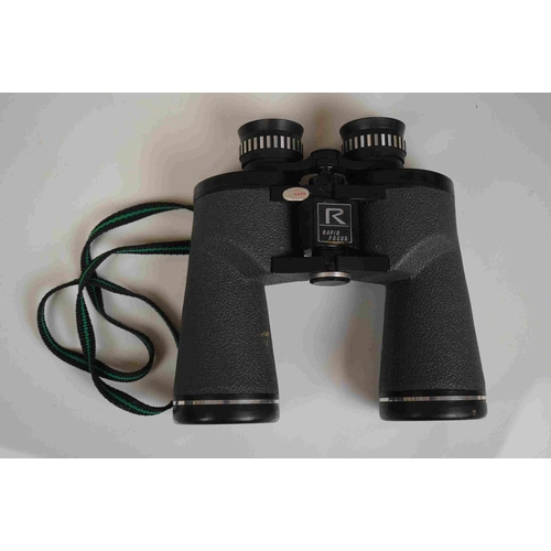 422 - A collection three pairs of modern binoculars together with a pair of opera glasses.