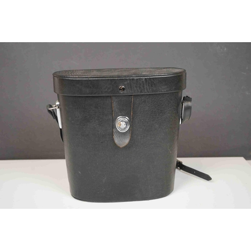 422 - A collection three pairs of modern binoculars together with a pair of opera glasses.