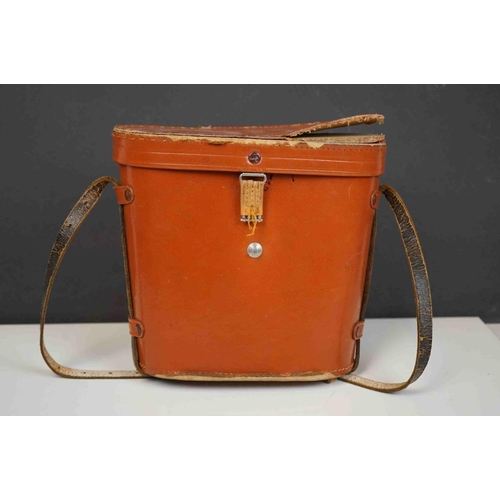 422 - A collection three pairs of modern binoculars together with a pair of opera glasses.