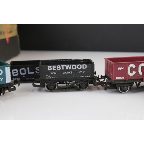 9 - Collection of 38 OO gauge items of rolling stock featuring mainly trucks and wagons to include Trian... 