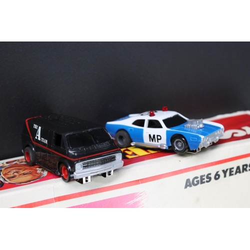 223 - Boxed Tyco A Team Action Racing set with both slot cars, unchecked but appears complete with control... 