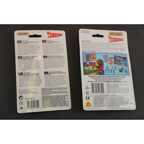 202 - 15 Carded Matchbox Thunderbirds figures in vg condition, some duplicated but onto different design c... 