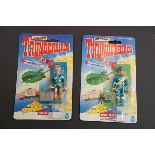 202 - 15 Carded Matchbox Thunderbirds figures in vg condition, some duplicated but onto different design c... 