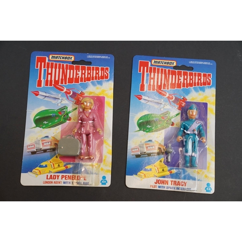 202 - 15 Carded Matchbox Thunderbirds figures in vg condition, some duplicated but onto different design c... 