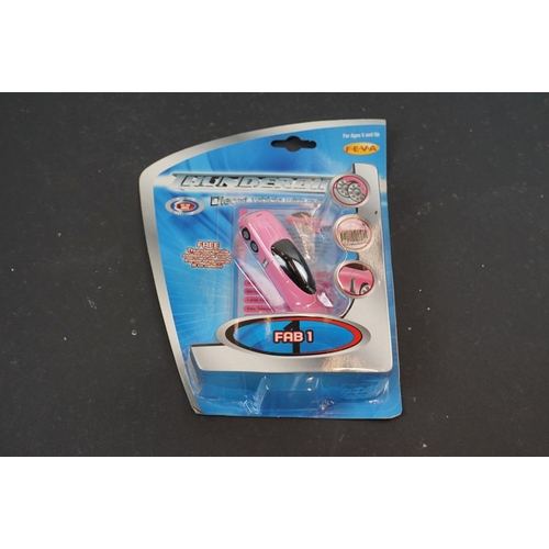 203 - Thunderbirds - Seven cardedBandai / FEVA Thunderbird diecast models plus 3 x unopened 4 packs of Thu... 