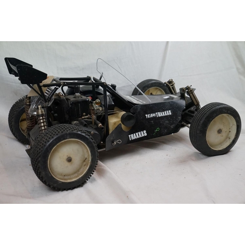 402 - A RC car buggy 1/8 scale Protech Ultrex Evo Nitro 0.21 4WD engine together with a CEN GSR 5.0 Nitro ... 