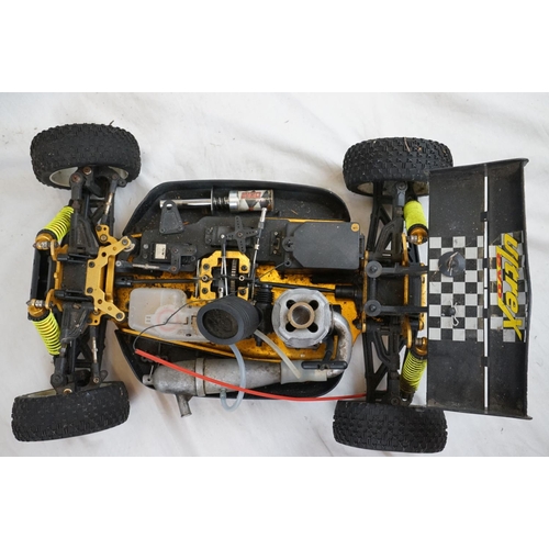 402 - A RC car buggy 1/8 scale Protech Ultrex Evo Nitro 0.21 4WD engine together with a CEN GSR 5.0 Nitro ... 