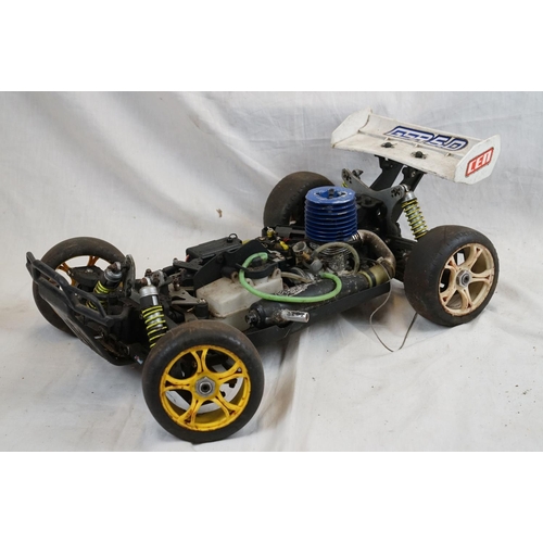 402 - A RC car buggy 1/8 scale Protech Ultrex Evo Nitro 0.21 4WD engine together with a CEN GSR 5.0 Nitro ... 