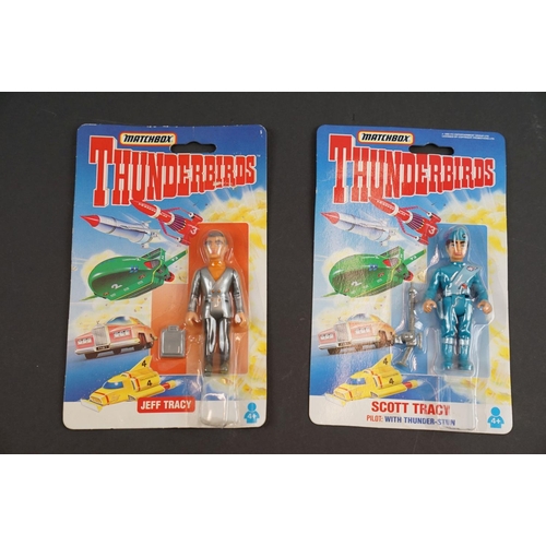 202 - 15 Carded Matchbox Thunderbirds figures in vg condition, some duplicated but onto different design c... 
