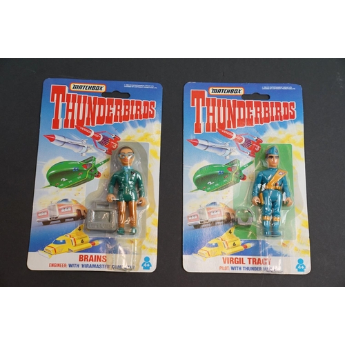 202 - 15 Carded Matchbox Thunderbirds figures in vg condition, some duplicated but onto different design c... 