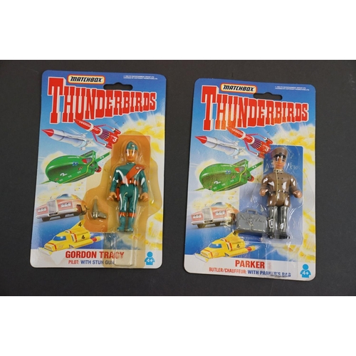 202 - 15 Carded Matchbox Thunderbirds figures in vg condition, some duplicated but onto different design c... 