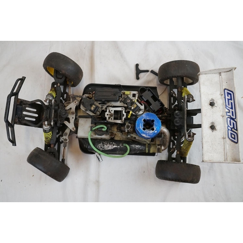 402 - A RC car buggy 1/8 scale Protech Ultrex Evo Nitro 0.21 4WD engine together with a CEN GSR 5.0 Nitro ... 