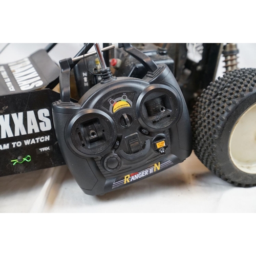 402 - A RC car buggy 1/8 scale Protech Ultrex Evo Nitro 0.21 4WD engine together with a CEN GSR 5.0 Nitro ... 