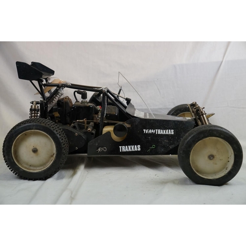 402 - A RC car buggy 1/8 scale Protech Ultrex Evo Nitro 0.21 4WD engine together with a CEN GSR 5.0 Nitro ... 
