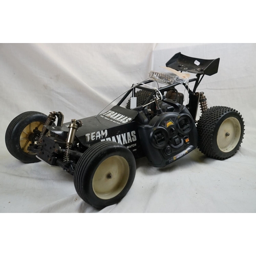402 - A RC car buggy 1/8 scale Protech Ultrex Evo Nitro 0.21 4WD engine together with a CEN GSR 5.0 Nitro ... 