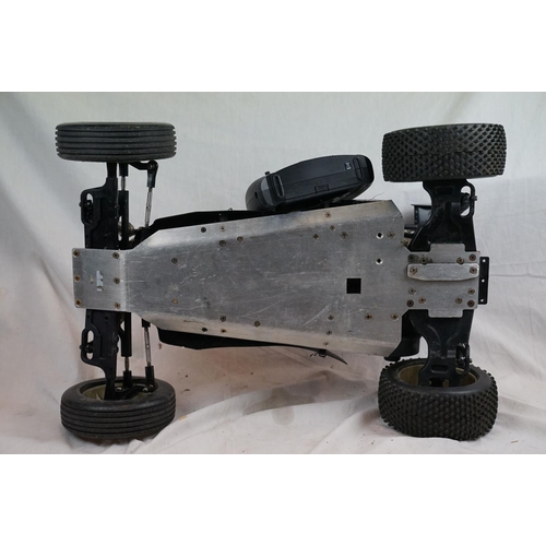 402 - A RC car buggy 1/8 scale Protech Ultrex Evo Nitro 0.21 4WD engine together with a CEN GSR 5.0 Nitro ... 
