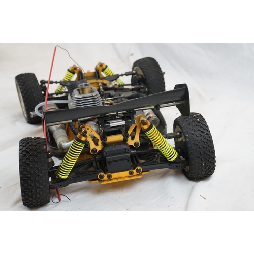 402 - A RC car buggy 1/8 scale Protech Ultrex Evo Nitro 0.21 4WD engine together with a CEN GSR 5.0 Nitro ... 