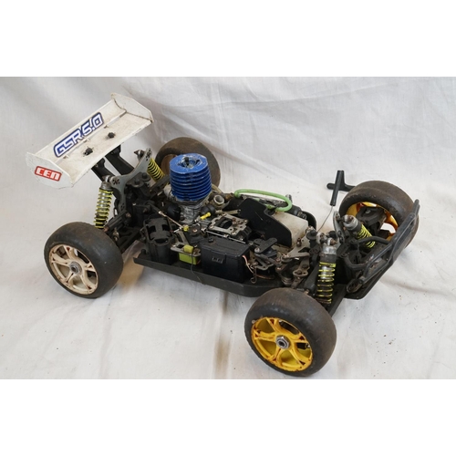 402 - A RC car buggy 1/8 scale Protech Ultrex Evo Nitro 0.21 4WD engine together with a CEN GSR 5.0 Nitro ... 