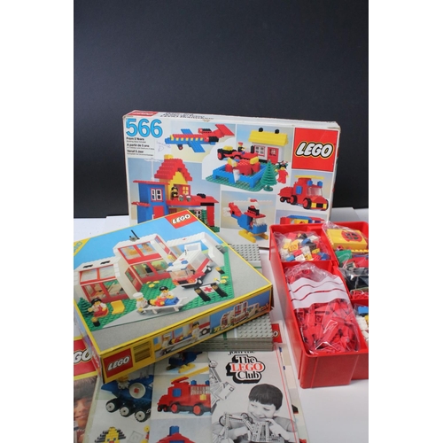 183 - A large collection of Lego to include set 6380 Ambulance Station, 6372 Cottage, 6501 Black Car, 6522... 