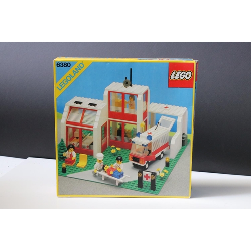 183 - A large collection of Lego to include set 6380 Ambulance Station, 6372 Cottage, 6501 Black Car, 6522... 