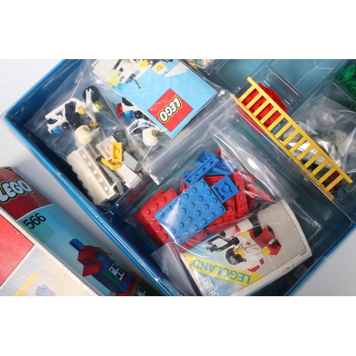 183 - A large collection of Lego to include set 6380 Ambulance Station, 6372 Cottage, 6501 Black Car, 6522... 