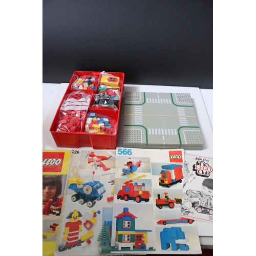 183 - A large collection of Lego to include set 6380 Ambulance Station, 6372 Cottage, 6501 Black Car, 6522... 