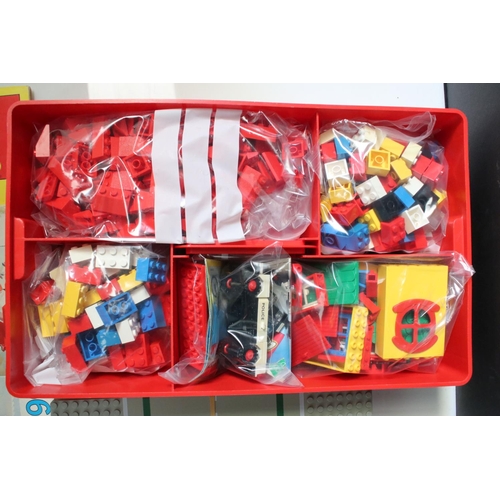 183 - A large collection of Lego to include set 6380 Ambulance Station, 6372 Cottage, 6501 Black Car, 6522... 